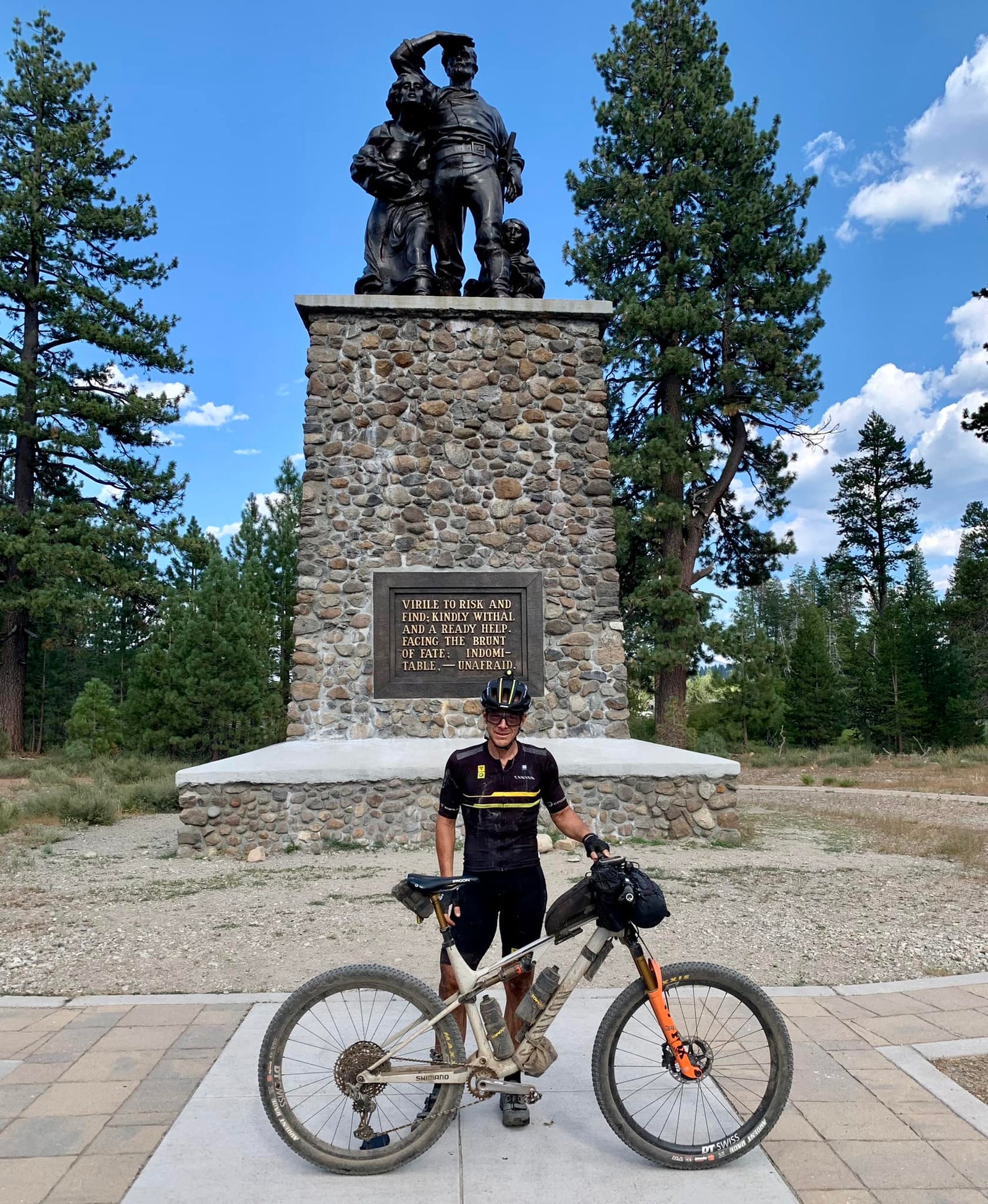 Jeff Kerkove standing in front of statue wearing Limar helmet