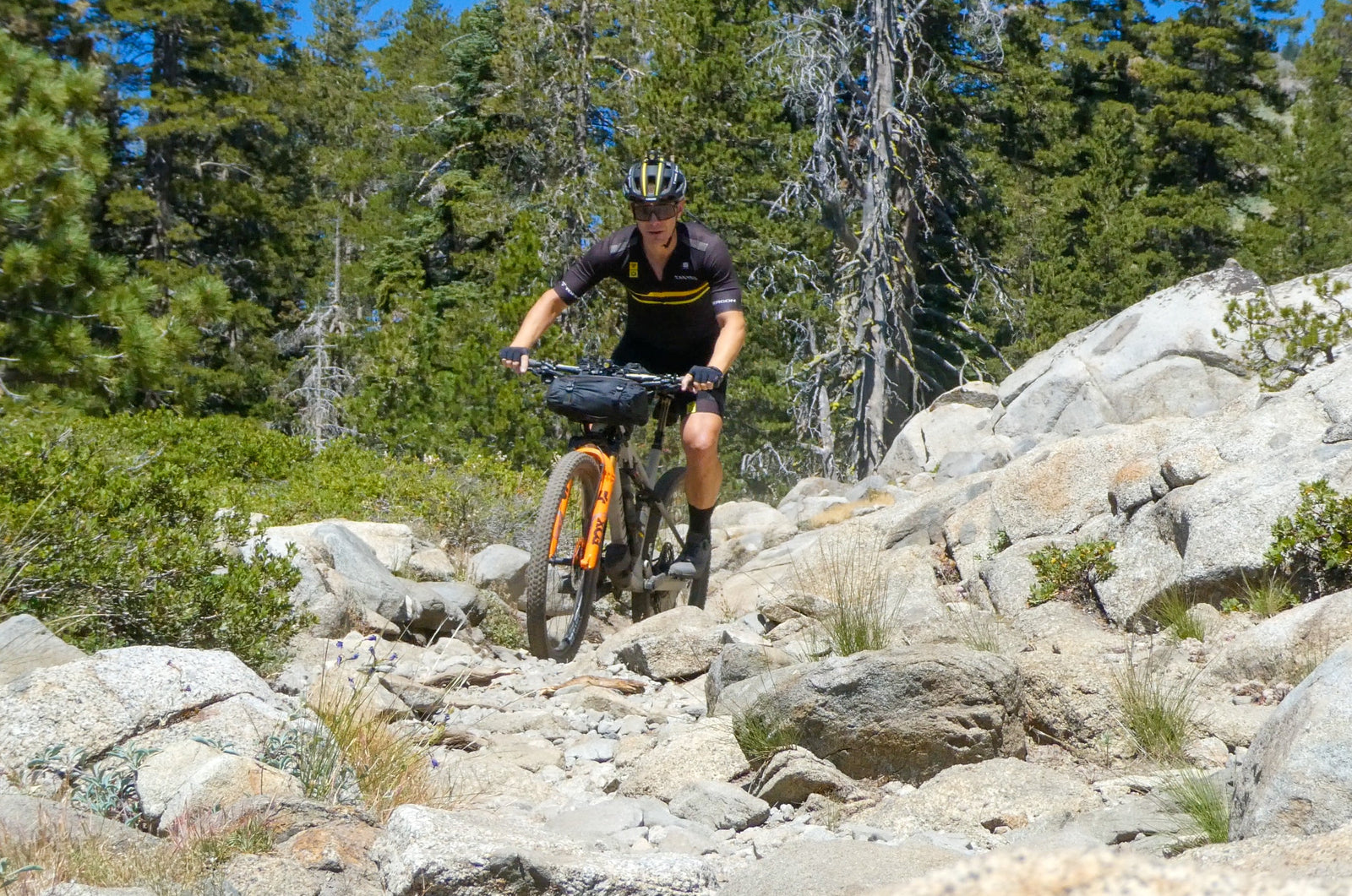 Jeff Kerkove wearing Limar helmet while riding rocky trail